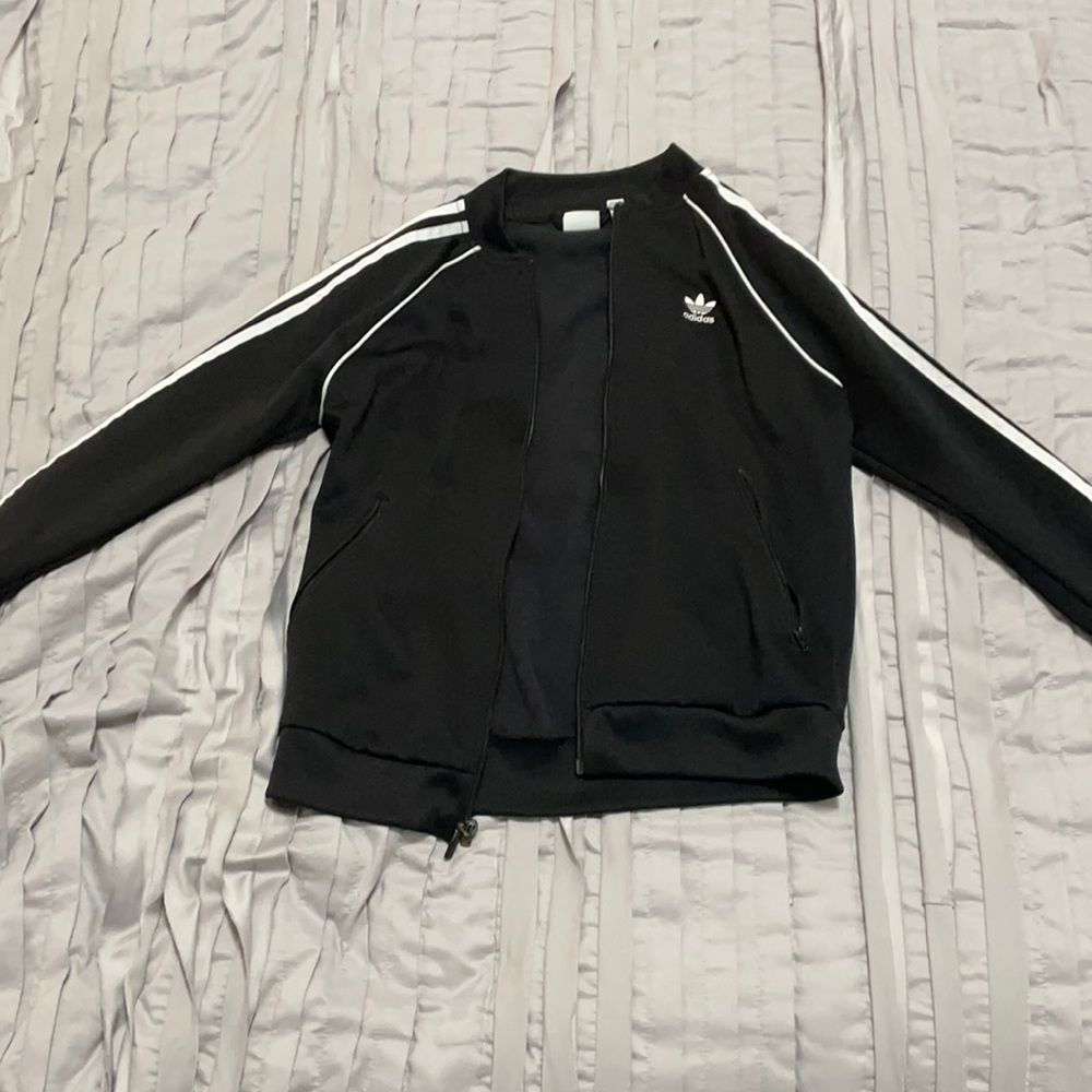 Adidas jacket/sweater. Black with white strips.
